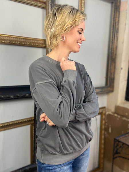 Side view of a Charcoal colored fleece sweatshirt with drop shoulders from Zenana