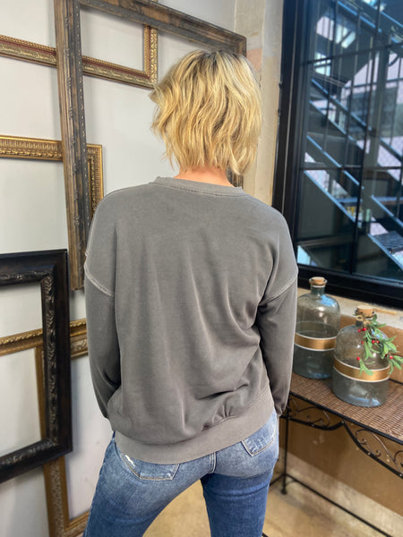 Back view of a charcoal colored fleece sweatshirt with drop shoulders from Zenana