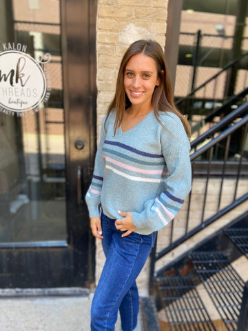 Light blue striped v neck sweater