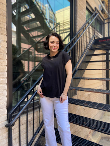 Introducing the Alex Black Folded Short Sleeve Tee – your go-to casual piece that effortlessly merges comfort with style. With its round neck and chic folded short sleeves, this basic tee is perfect for any occasion, from coffee dates to weekend outings.

- Crafted from 100% cotton for ultimate comfort
- Relaxed drop shoulder design for a trendy fit
- Available in sizes Small, Medium, and Large
- Easy care: hand wash cold, line dry
 