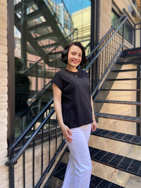 Introducing the Alex Black Folded Short Sleeve Tee – your go-to casual piece that effortlessly merges comfort with style. With its round neck and chic folded short sleeves, this basic tee is perfect for any occasion, from coffee dates to weekend outings.

- Crafted from 100% cotton for ultimate comfort
- Relaxed drop shoulder design for a trendy fit
- Available in sizes Small, Medium, and Large
- Easy care: hand wash cold, line dry
 