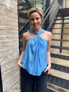 Introducing the Amara Light Blue Reversible Blouse, your new go-to top for effortless style. Made of dreamy satin, this top features a stunning reversible design in a calming blue hue. Versatile and chic, it's perfect for any occasion.