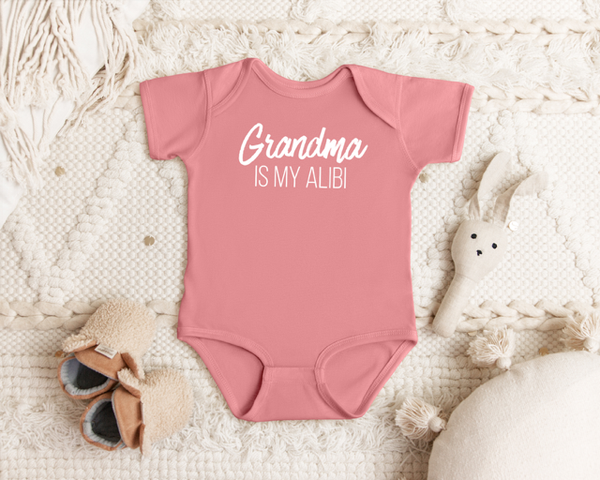 GRANDMA IS MY ALIBI BABY ONESIE: Dusty Rose -18 months
