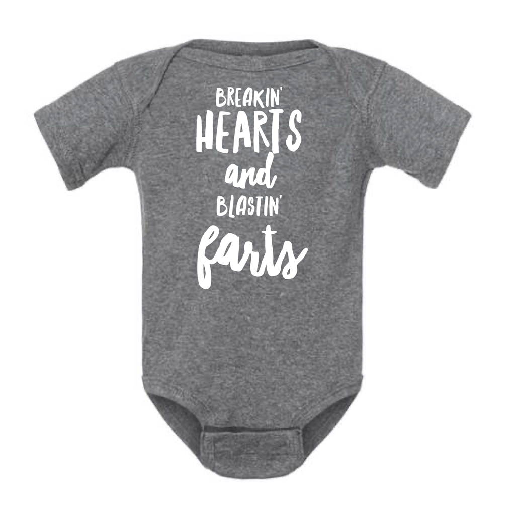 BREAKIN' HEARTS AND BLASTIN' FARTS BABY ONESIE: Black -6 months