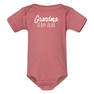 GRANDMA IS MY ALIBI BABY ONESIE: Dusty Rose -6 months
