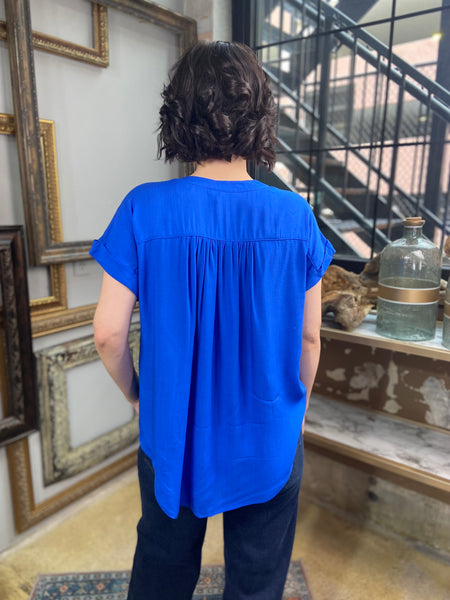 royal blue button down t shirt cuffed sleeves long lightweight v neck shirt back view