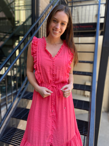  Ruffle detail button front midi dress

• High waist and slip design for added comfort

• Beautiful coral color that’s perfect for any occasion 
coral dress