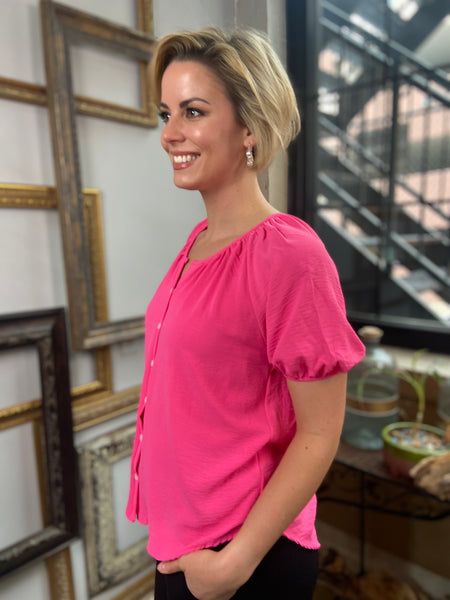 everly puffy sleeve short sleeve hot pink round neck button down top paired with black jeans