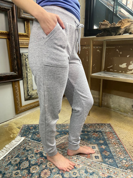 light gray heather joggers cuffed sweatpants drawstring waistband side view