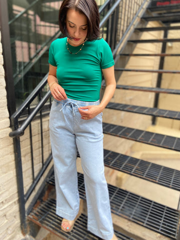 Elevate your casual wardrobe with the Kalisa Drawstring Wide Leg Pants. These pants perfectly combine style and comfort, featuring a relaxed fit and adjustable drawstring for a custom feel. Whether you're lounging at home or heading out for the day, they are versatile enough for any occasion.

- Made from breathable fabric for all-day comfort
- Effortlessly stylish with your favourite tops and accessories
- Ideal for both relaxation and casual outings