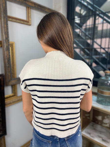 Back view of a black & white striped short sleeve sweater with mock neck from Blue Pepper