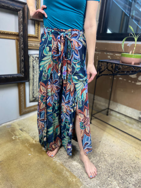 floral pattern pants elastic waist with bow tie front leg slits paired with teal top