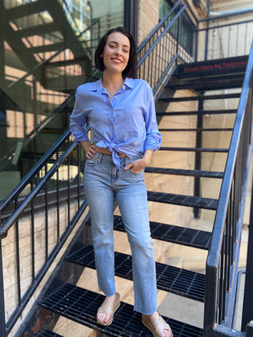 lenox straight leg light wash jeans mid rise raw hem jeans paired with light blue button up