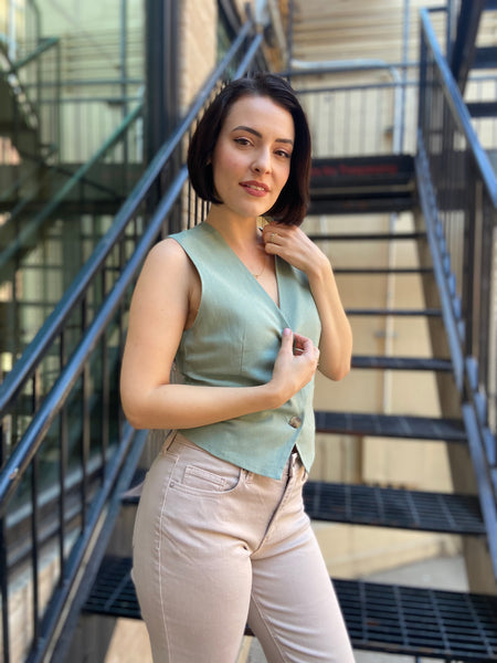 leslie mint green blazer linen vest paired with cream jeans