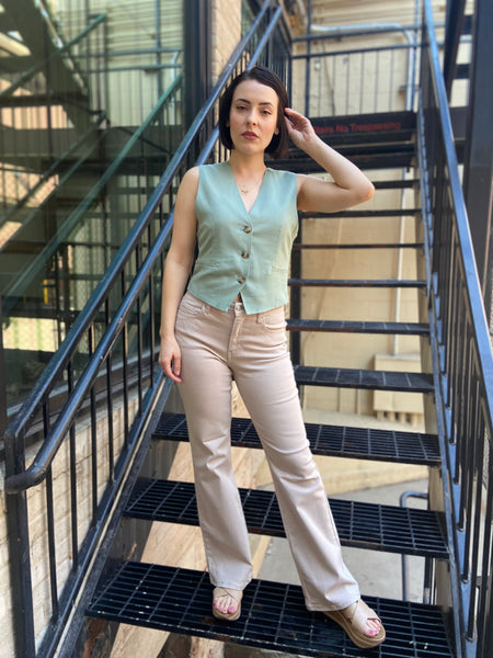 leslie mint green blazer linen vest paired with cream jeans