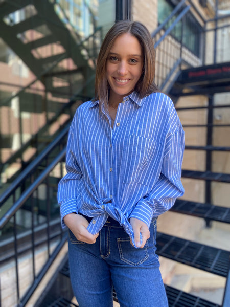 lisette blue and white striped linen button up paired with jeans