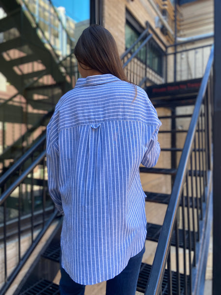 lisette blue and white striped linen button up paired with jeans