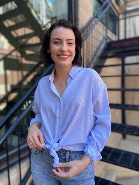 lizzy blue and white stripe linen button up paired with jeans