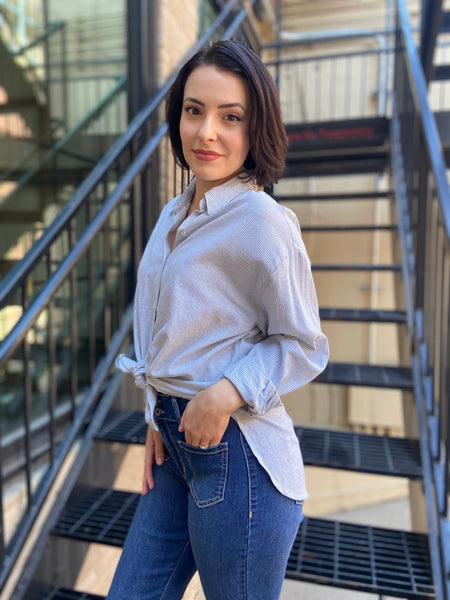 lizzy mint green striped linen button up paired with jeans