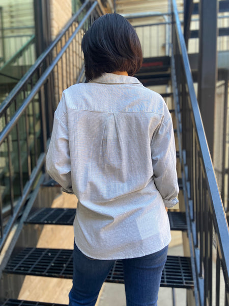 lizzy mint green striped linen button up paired with jeans