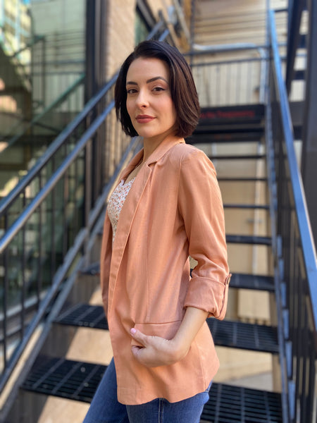 luella clay linen blazer paired with jeans