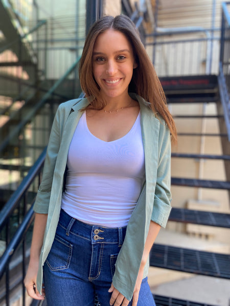 luella mint green linen blazer paired with jeans