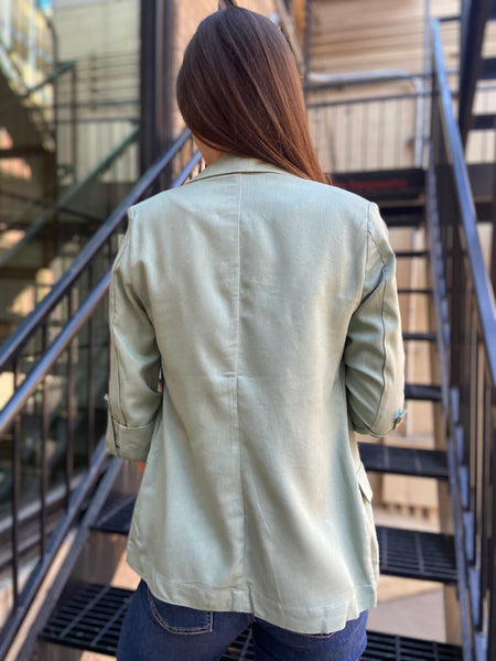 luella mint green linen blazer paired with jeans