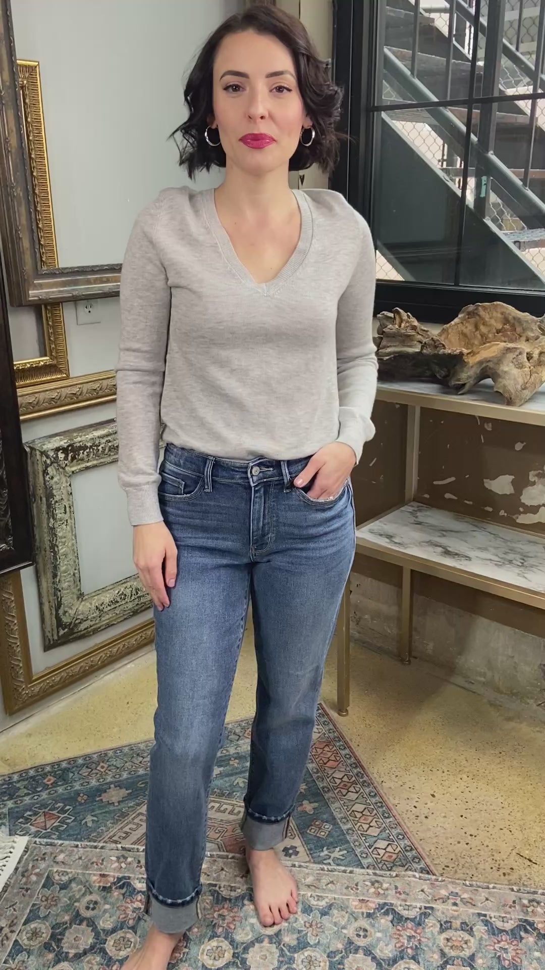judy blue jeans boyfriend fit cuffed bottom dark to medium wash paired with gray long sleeve