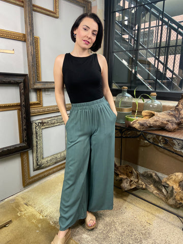 sofia ash jade elastic pants pockets paired with black top