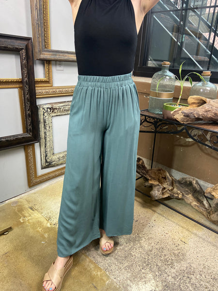 sofia ash jade elastic pants pockets paired with black top