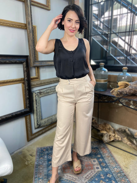 sylvie khaki linen pants with pockets double button linen pants paired with black blouse shirt