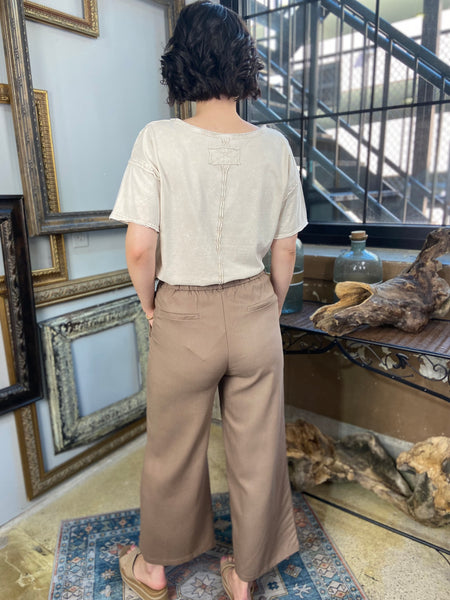 sylvie mocha  linen pants with pockets double button linen pants paired with cream shirt