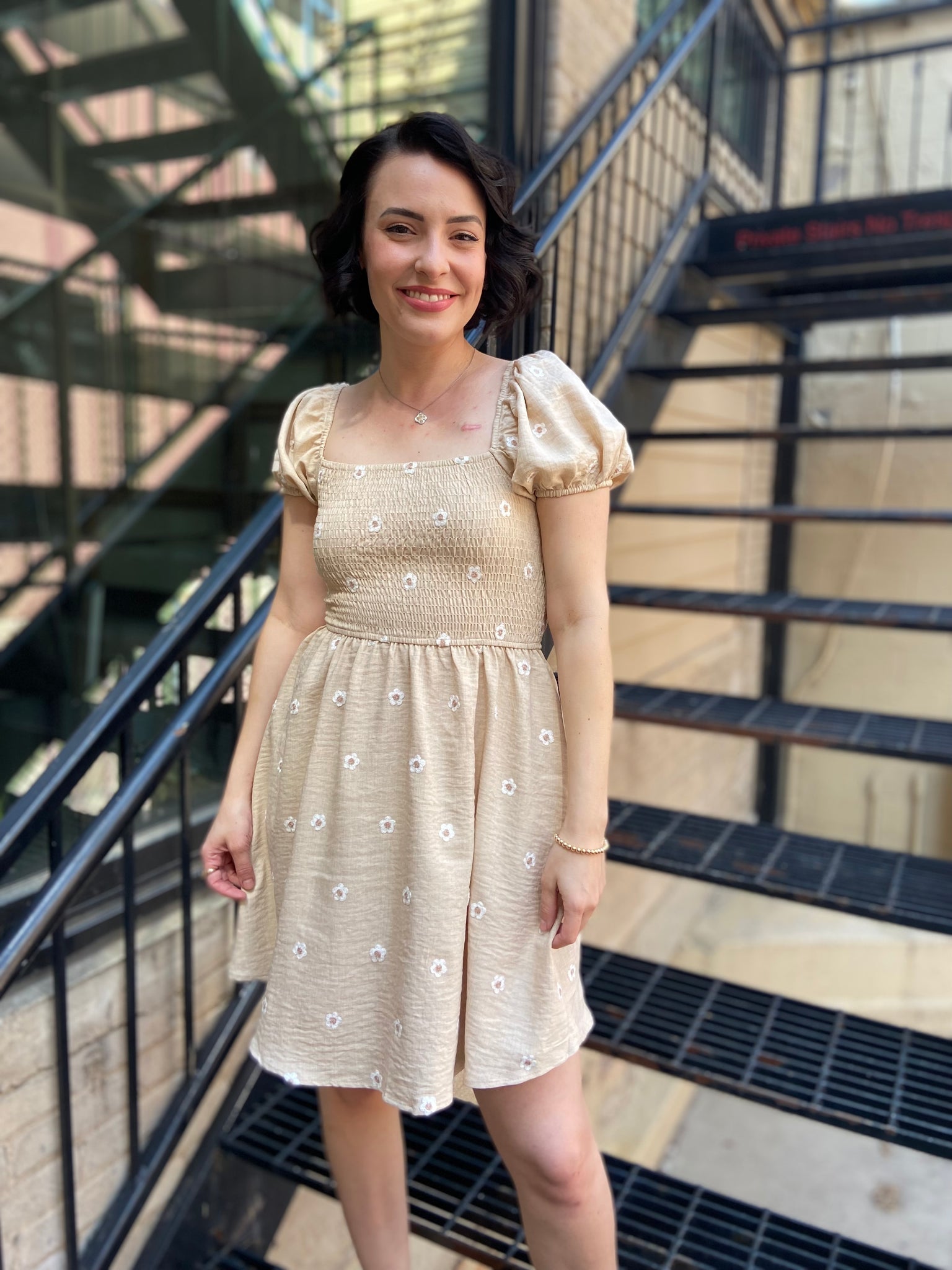 Introducing the Taryn Khaki Daisy Mini Dress – your go-to piece for effortless chic style! This dress combines a playful daisy print with a flattering mini silhouette that’s perfect for any occasion. Whether you're headed to brunch or a summer picnic, you'll love how easy it is to style.

- Light and breathable fabric for all-day comfort
- Flattering mini length for a trendy look
- Playful daisy print adds a touch of fun
- Versatile for both casual and dressy outings
- Pair it with sandals or heels for any 